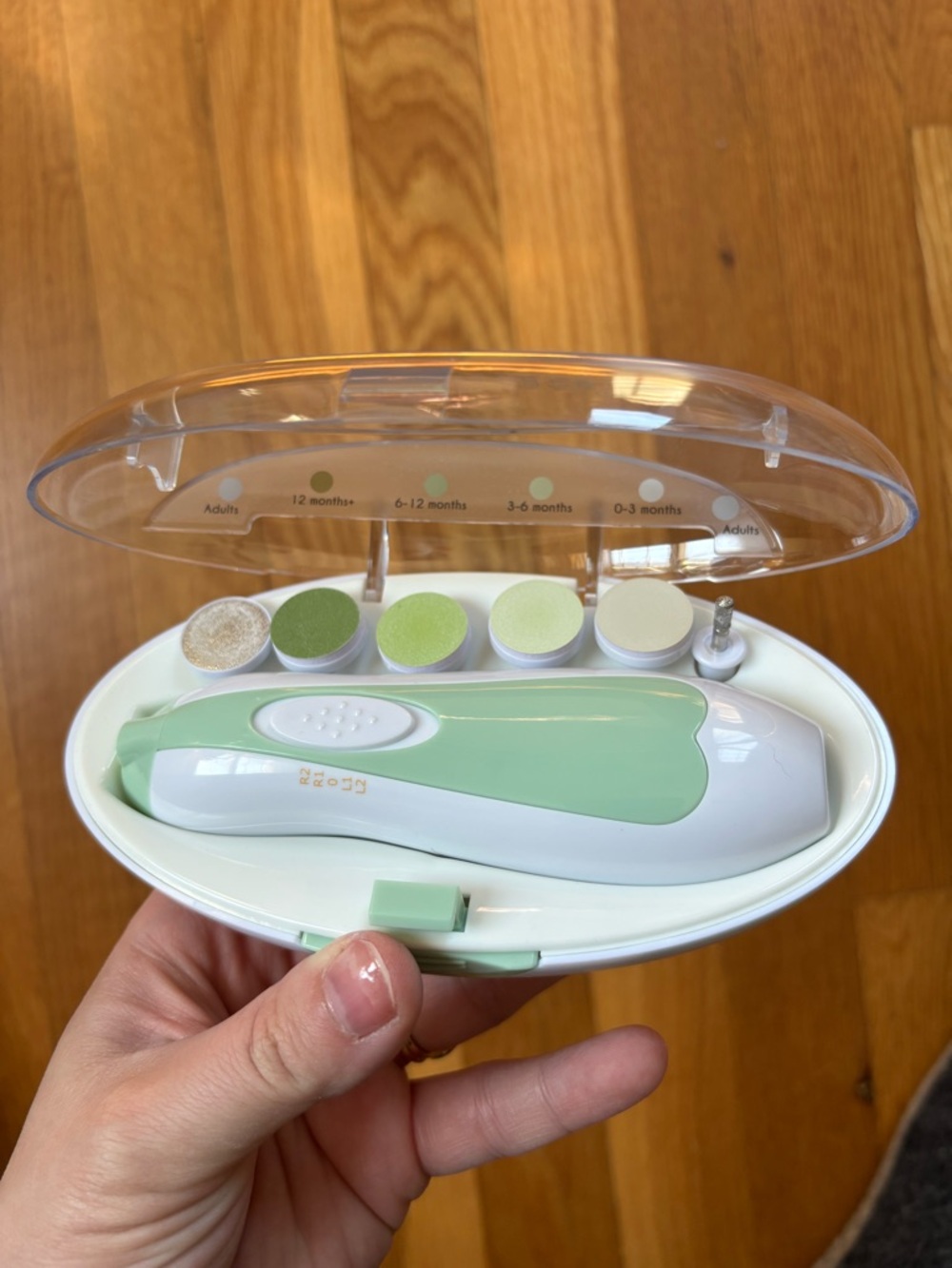 Electric Baby Nail Groomer in Mint Green with Multiple Attachments